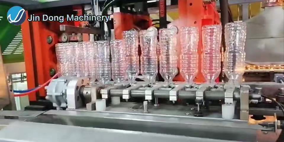 blowing test of the automatic bottle blowing machine in customer factory video